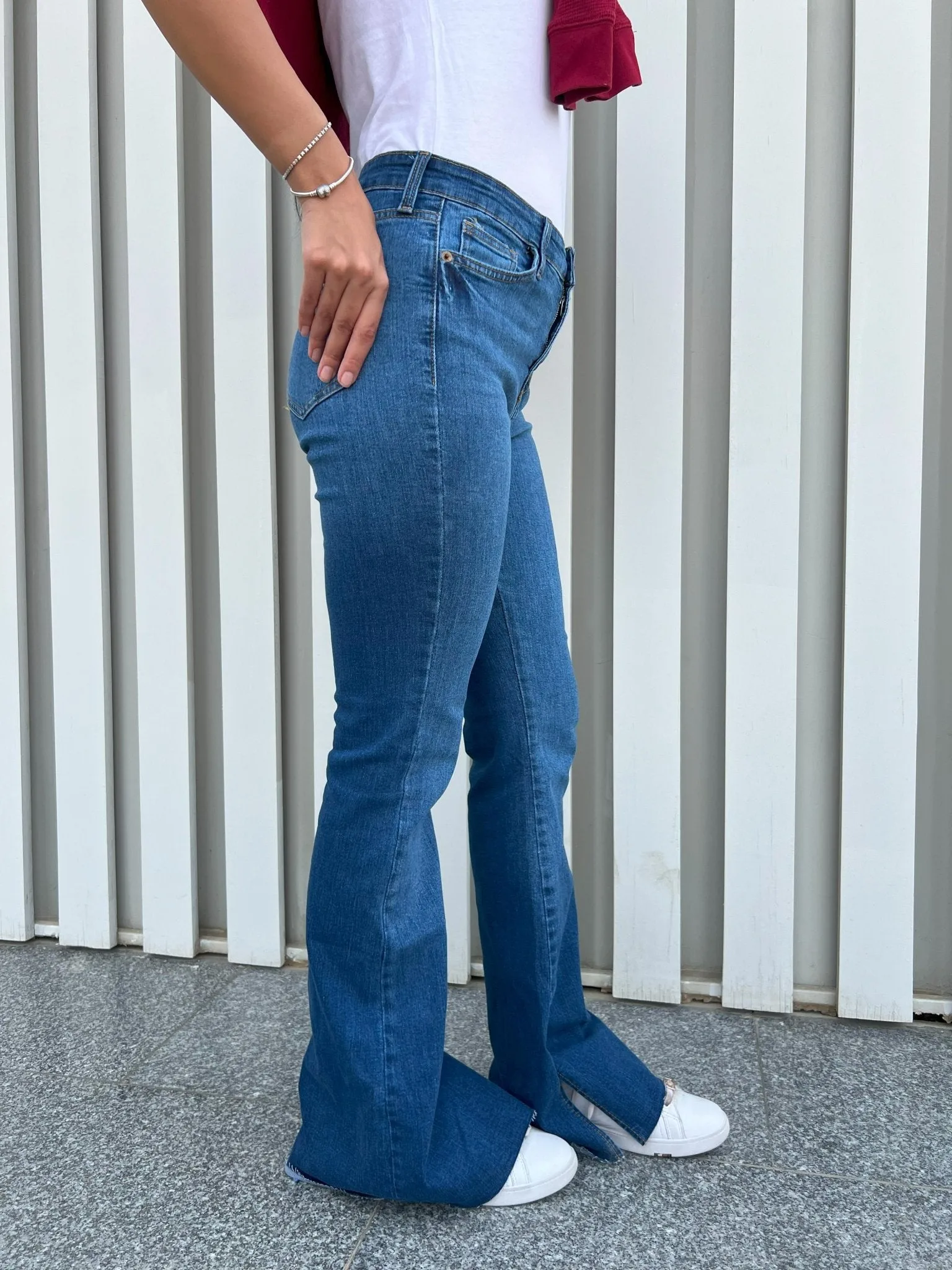 Dark Blue Split Hem Flared Jeans.